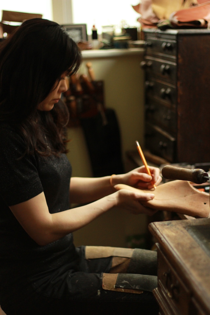 Emiko Matsuda working on a wooden shoe last at her lastmaking bench